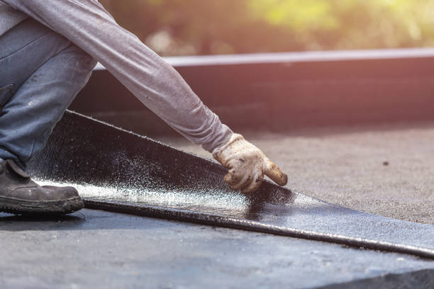 Professional Waterproofing technician working in Gwynneville, IN